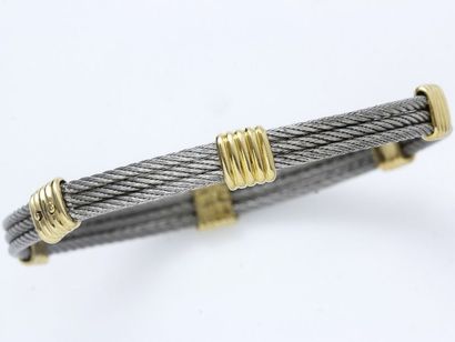 null FRED ''Force 10''

Bracelet jonc rigide, composé de 3 fils en acier torsadé,...