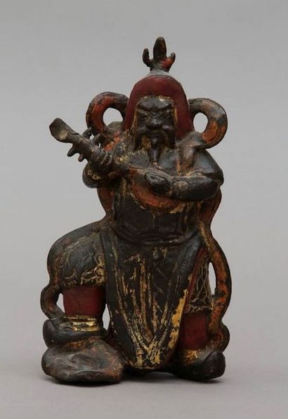null CHINE XVII Siècle - GARDIEN DE TEMPLE en bronze laqué et doré

H. 20 cm

(petits...