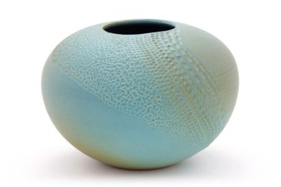 null Atelier MADOURA 

Vase boule circa 1980

Céramique émaillée turquoise et empruntes...