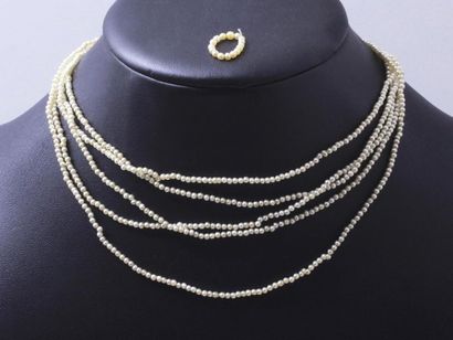 null Short necklace composed of 5 rows of seed beads, embellished with a silver plated...