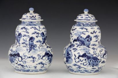 null SOUTH CHINA or VIETNAM, circa 1900
Pair of blue-white porcelain swollen covered...