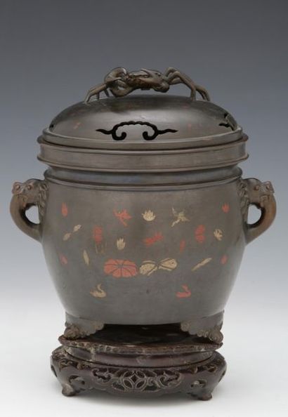 null INDOCHINA circa 1900

Patinated bronze perfume burner with inlaid decoration...