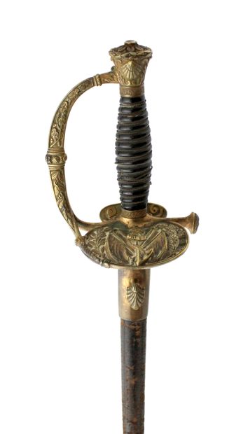 null NAVAL OFFICER'S SWORD

Horn fuse with relaxed filigree. Chased brass mounting....