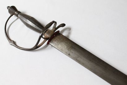 null SWORD IN THE STYLE OF THE EIGHTEENTH CENTURY. 

Iron mounting, hilt with a branch...