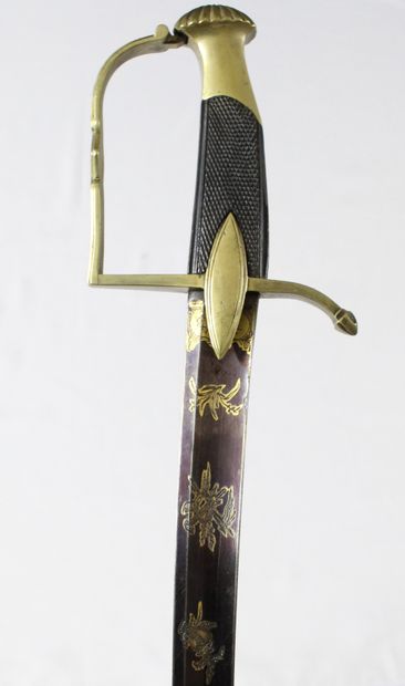 null OFFICER'S SABER OF LIGHT CAVALRY. 

Checkered wood handle. Brass mounting, pommel...