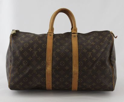 null Louis VUITTON année 1985

SAC " Keepall " 45cm en toile Monogram et cuir naturel,...