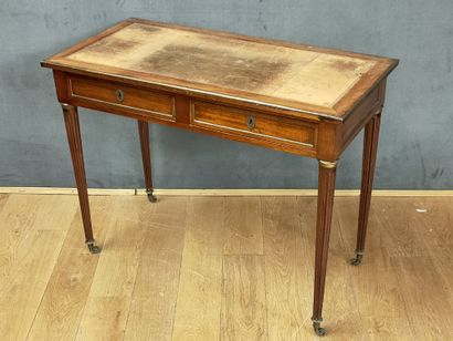 null SMALL FLAT DESK in the Louis XVI style, early 19th Century, all mahogany fronts,...