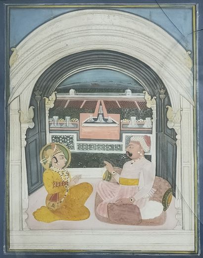 null Conversation between a seated Raja, adorned with many jewels, and a dignitary...