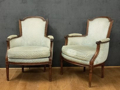 null Pair of Louis XVI period walnut cabriolet backs with carved and fluted moldings,...