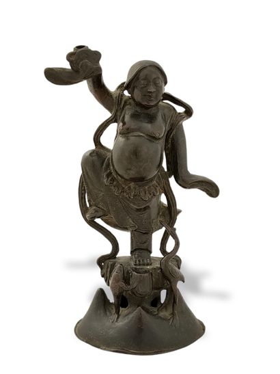 null CHINA 17th - 18th Century

DANCING SUBJECT forming an incense holder in patinated...