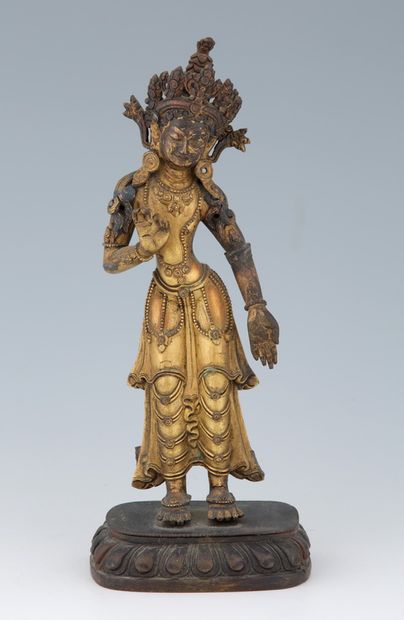 null 
CHINA, TIBET 19th Century




Gilded and patinated bronze STATUTE with traces...