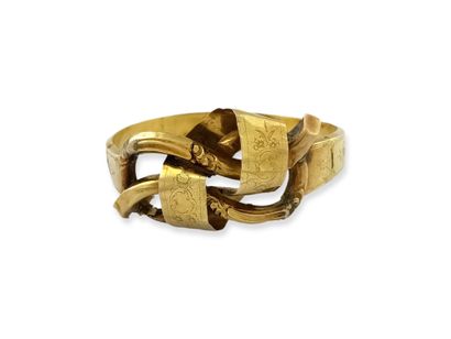null RIGID RIBBON BRACELET in yellow gold 750 Millièmes decorated with a ribbon knot...