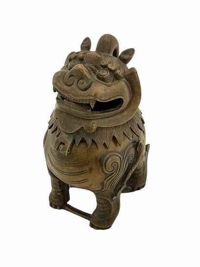 null CHINE, Dynastie QING- XIXème Siècle

BRULE-PARFUM en bronze figurant un Qilin

H....