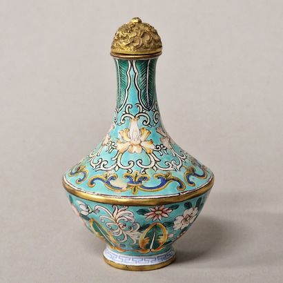 null China, 19th Century 

Canton enamel TABATIER BOTTLE decorated with lotus flowers,...
