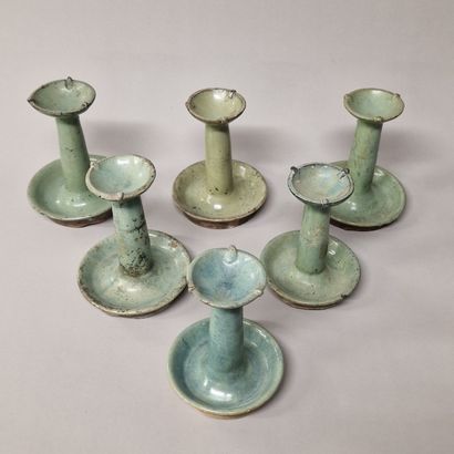 null CHINA, Qing period

SET of celadon glazed terra cotta PRESENTOIRS or CANDLES...