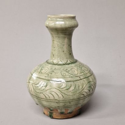 null SOUTH-EAST ASIA, 18th century 

A celadon glazed terracotta vase with scrolls...