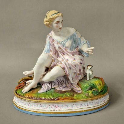 null GROUPE Circa 1860-1880 en biscuit polychrome et or figurant Diane assise 
Socle...