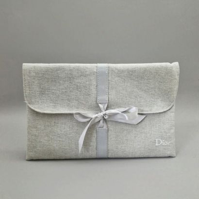 DIOR - TRAVEL KIT in cotton and grey satin
containing...