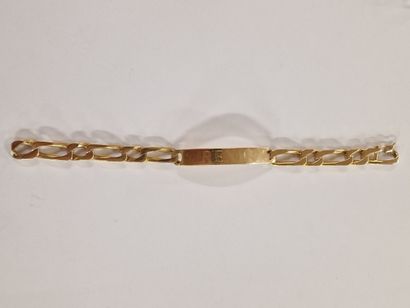 null GOURMETTE PATRONYMIQUE BRACELET in yellow gold 750 Millièmes with figaro links...