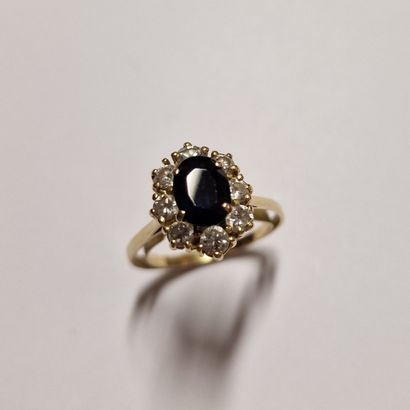 null MARGUERITE MODERN RING in yellow gold 750 Millièmes centered on a sapphire in...