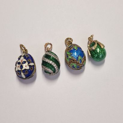 null RUSSIA - SOVIET PERIOD, Set of 4 PENDANT EGGS: 
- 1 in vermeil (960 thousandths)...