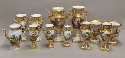 null PARIS - 9 VASES INCLUDING 3 PAIRS AND A CAFETIERE in white and gold porcelain...