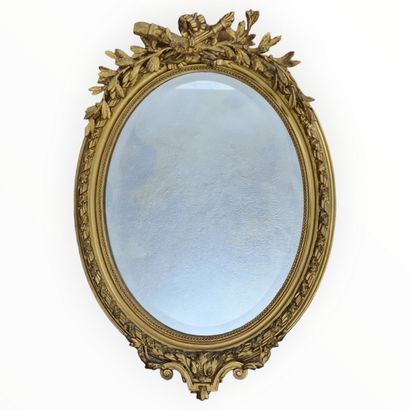 null BISEAUTE MEDAILLON MIRROR in the Louis XVI style Circa 1900 in wood and gold...