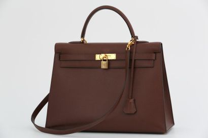 null HERMES PARIS - SAC KELLY  35.5 cm en cuir grainé chocolat
Avec cadenas clef...