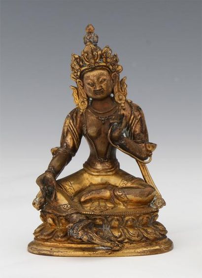 null TIBET XVIIIe Siècle

SUJET en bronze doré représentant la Tara verte assise...