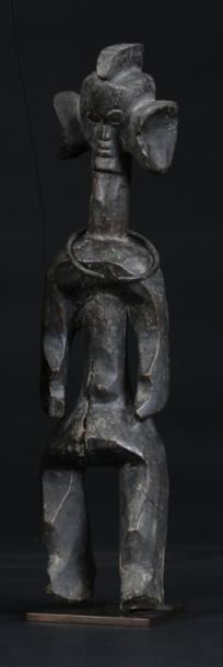 null NIGERIA MUMUYE Statue "Iagalganga" à patine noire, les bras détachés du corps,...
