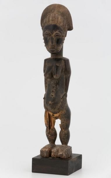 null COTE D'IVOIRE BAOULE Statuette féminine de type "Asié-Usu", figurant un esprit...