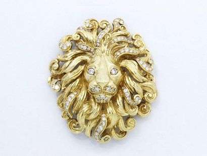 null FRED 

Broche pendentif en or 750 millièmes ciselé stylisant une tête de lion...