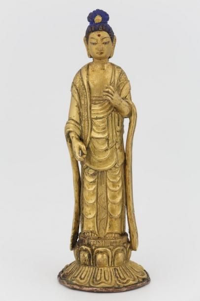 null TIBET XXème Siècle

Statuette de Bouddha en bronze doré et cuivre avec polychromie

H....