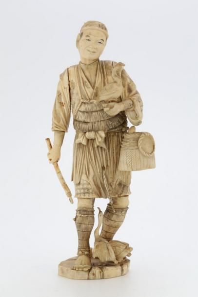 null JAPON Période Meiji (1868-1912)

Groupe en ivoire et ivoire marin sculpté formé...