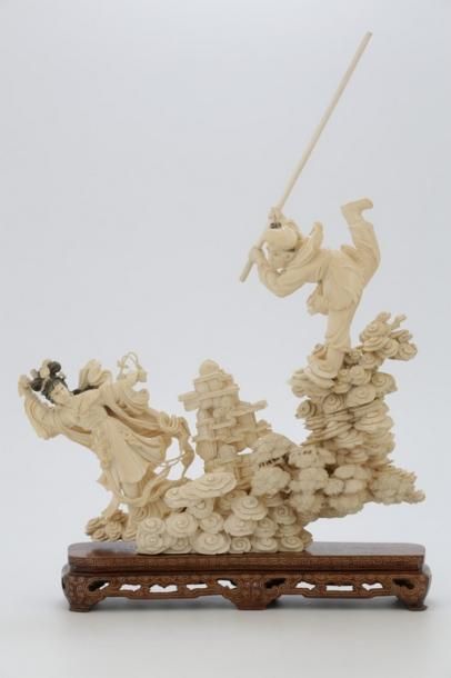 null CHINE Début du XXème Siècle

Important groupe en ivoire sculpté (deux parties)...