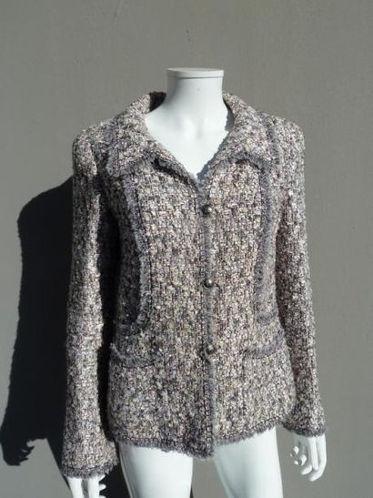 null CHANEL Collection Automne/Hiver 2004

Passage n°13

Veste en tweed chiné dans...