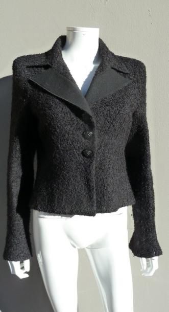 null CHANEL Collection Automne/Hiver 2009

Passage n°65

Veste courte en lainage...