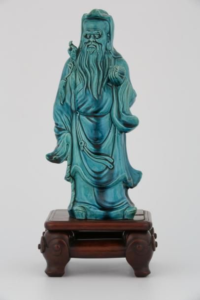 null CHINE Vers 1900

SUJET en porcelaine émaillée bleu turquoise représentant un...