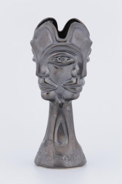 null Jean MARAIS (1913-1998)

Vase Visages

Céramique et émail métallique

Signée

H....