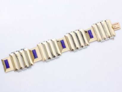 null 10/ Bracelet articulé 2 tons d'or 750 millièmes, composé de 4 maillons ornés...