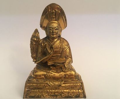 null TIBET XVIIIème Siècle

PETIT SUJET en bronze doré représentant le PANCHEN LAMA...