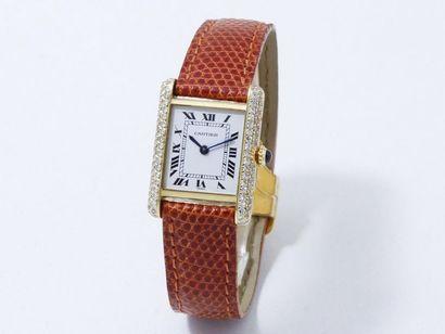 null CARTIER ''TANK''

Montre bracelet de dame en or 750 millièmes, cadran blanc...