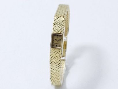 null 411/ OMEGA

Montre bracelet de dame en or 750 millièmes, cadran doré avec index...