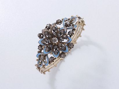 null 438/ Bracelet jonc ouvrant en or 375 millièmes centré d'une fleur émaillée de...