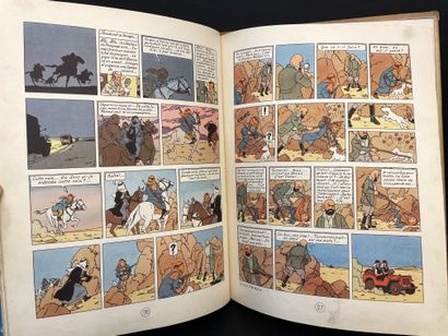 HERGÉ. 丁丁历险记》（The Adventures of Tintin）。在黑色的国家。图尔奈，卡斯特曼，1950年，4°，62页，第4版B4，深蓝色底纸，黄色书脊，第1版上有标题："Au...