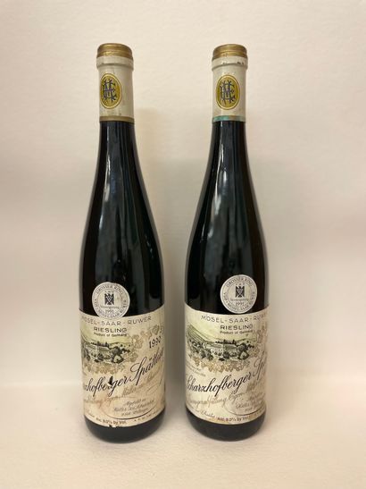 null "Scharzhofberger Spätlese - Egon Müller" (1990). Two bottles. Good levels, capsules...