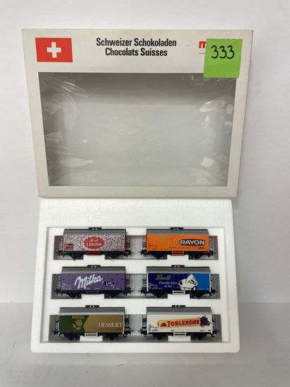 MÄRKLIN. Coffret de 6 wagons chocolats suisse avec inscriptions LINDOR, MILKA, LINDT,...