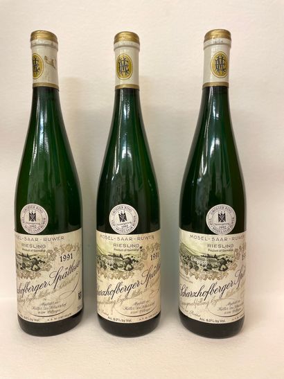 null "Scharzhofberger Spätlese - Egon Müller" (1991). Three bottles. Good levels,...