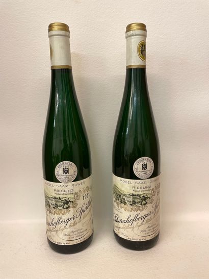 null "Scharzhofberger Spätlese - Egon Müller (1991). Two bottles. Good levels, capsules...