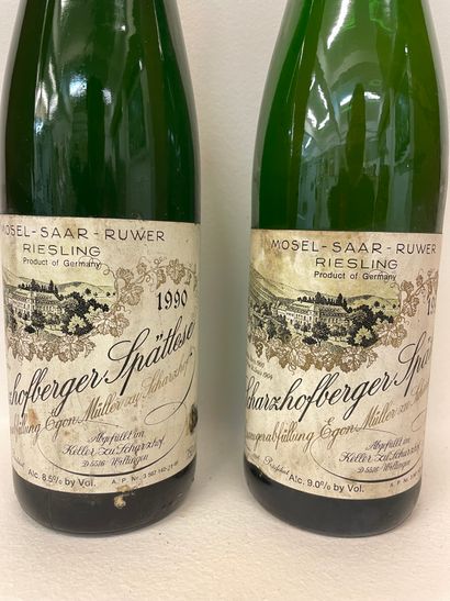 null "Scharzhofberger Spätlese - Egon Müller" (1990). Two bottles. One with a good...